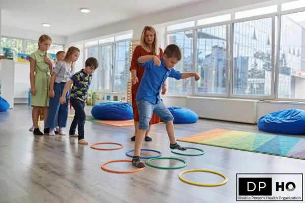 Disable Persons Health Organization logo and children in an indoor activity class with hoops.