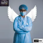 A professional healthcare worker wearing blue medical scrubs, a face mask, a surgical cap, and a stethoscope, standing with arms crossed. Large white angel wings are positioned behind them against a solid grey background. The image includes logos for "Special Ed Expert Ali" and "DP HO (Disable Persons Health Organization)," symbolizing the heroic and dedicated nature of caregivers for the 2026-27 "Blueprint of Caregivers" initiative.